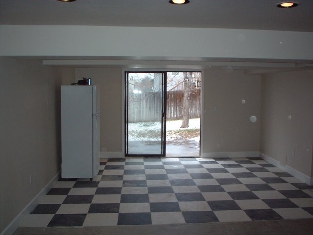 finishedmainbasementroom.jpg